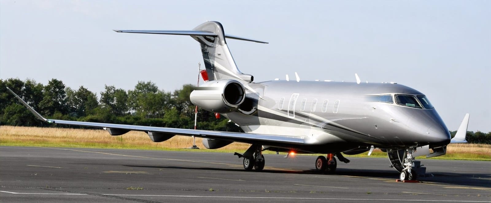 Charter-a ltd bombardier challenger 3500 private jet parked on the apron